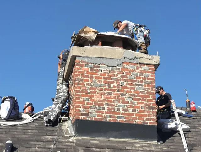 Bradenton Chimney Sweep installing a custom chimney crown in Bradenton, FL