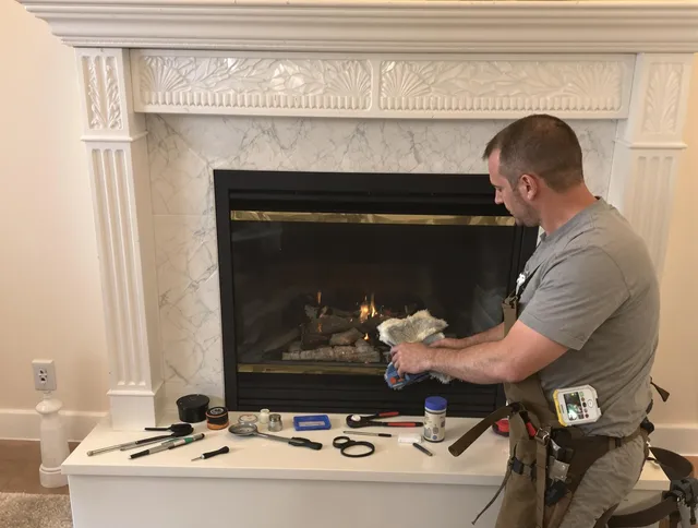 Bradenton Chimney Sweep performing fireplace maintenance in Bradenton, FL